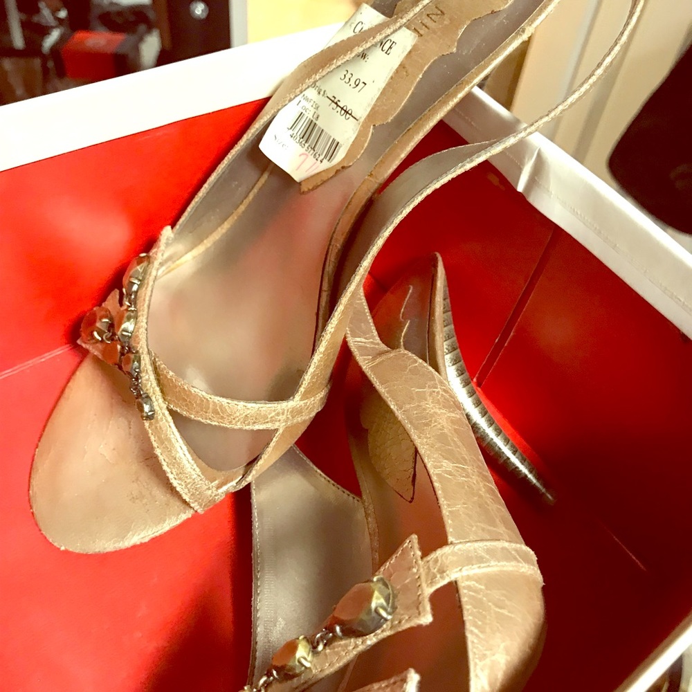 Gold heel.  Worn once